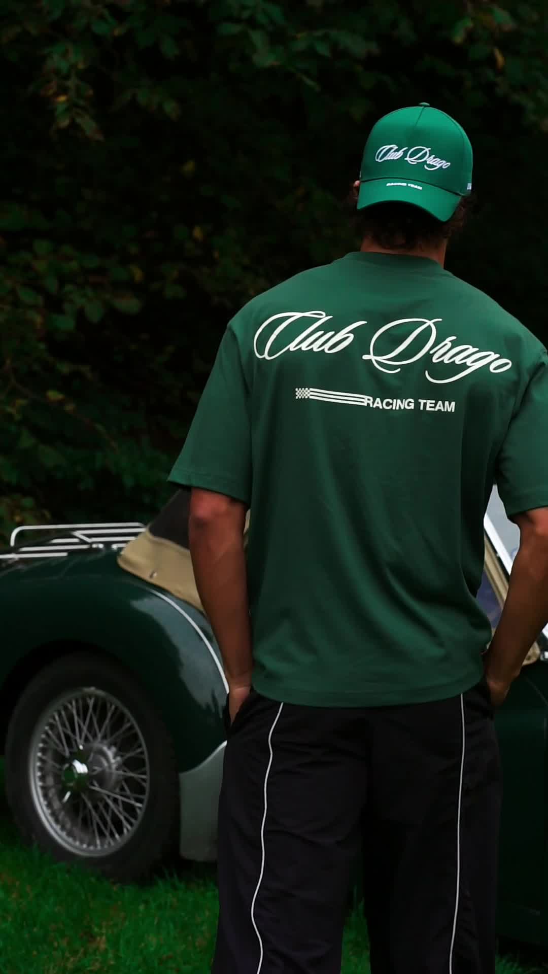 Daniel wearing our Racing Team Trucker Cap, Racing Team T-Shirt and Track Pants Obsidian at a classic car event