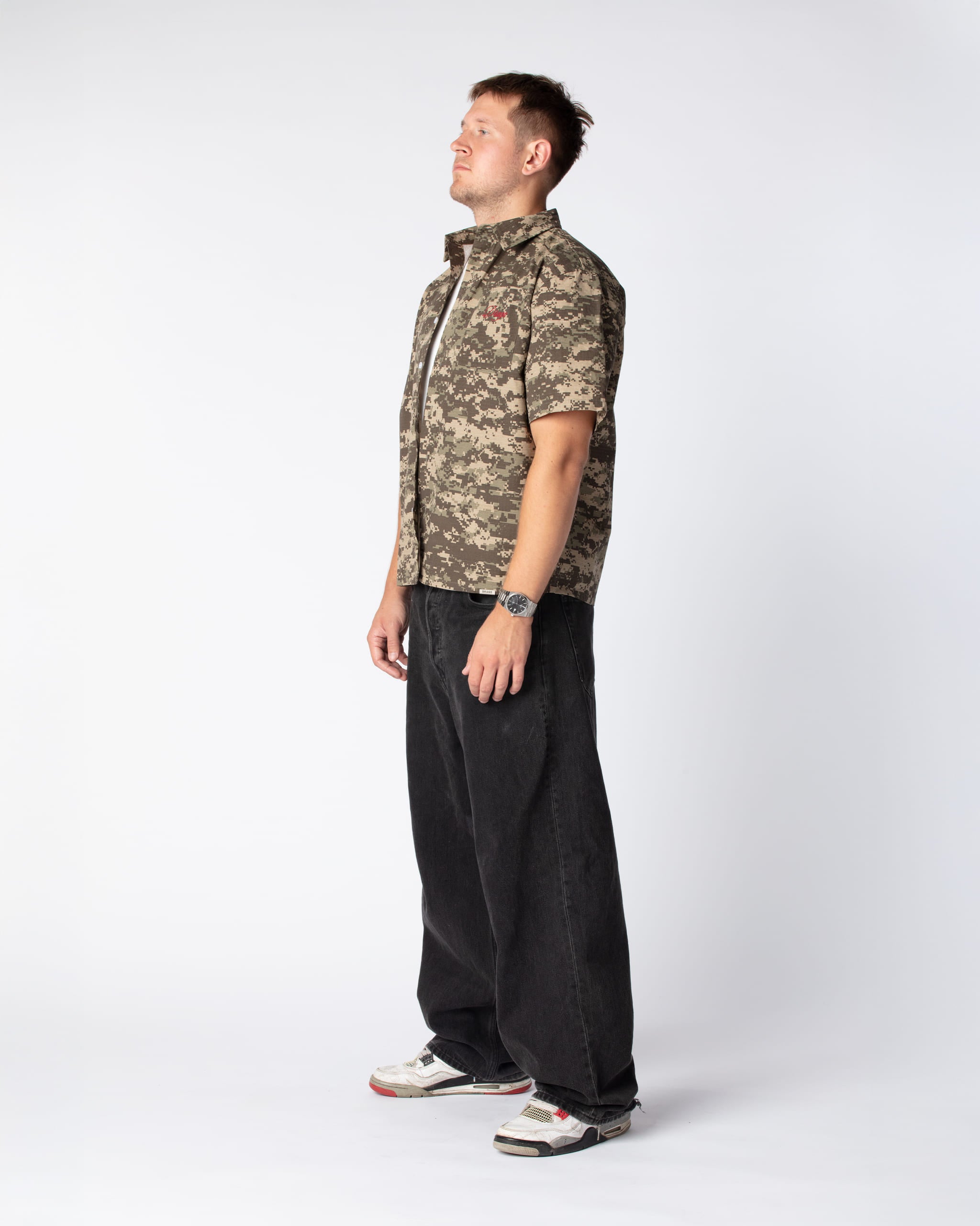 Mathias in the DRAGO Short Sleeved Script Shirt Digital Camo, made from 100% premium cotton