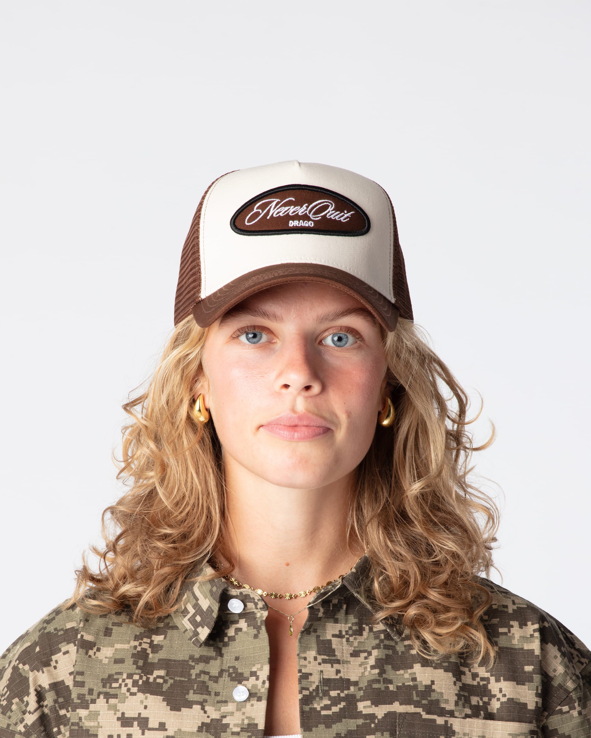 DRAGO MOTTO MESH TRUCKER CAP made from premium high quality cotton panels and polyester mesh material.