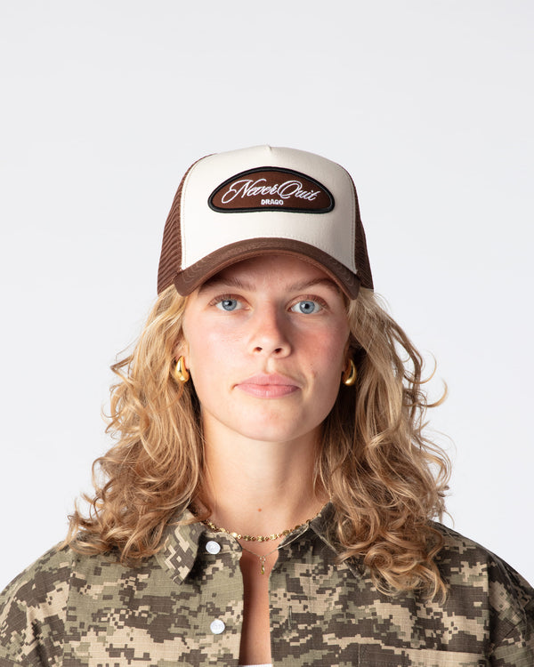 DRAGO MOTTO MESH TRUCKER CAP made from premium high quality cotton panels and polyester mesh material.