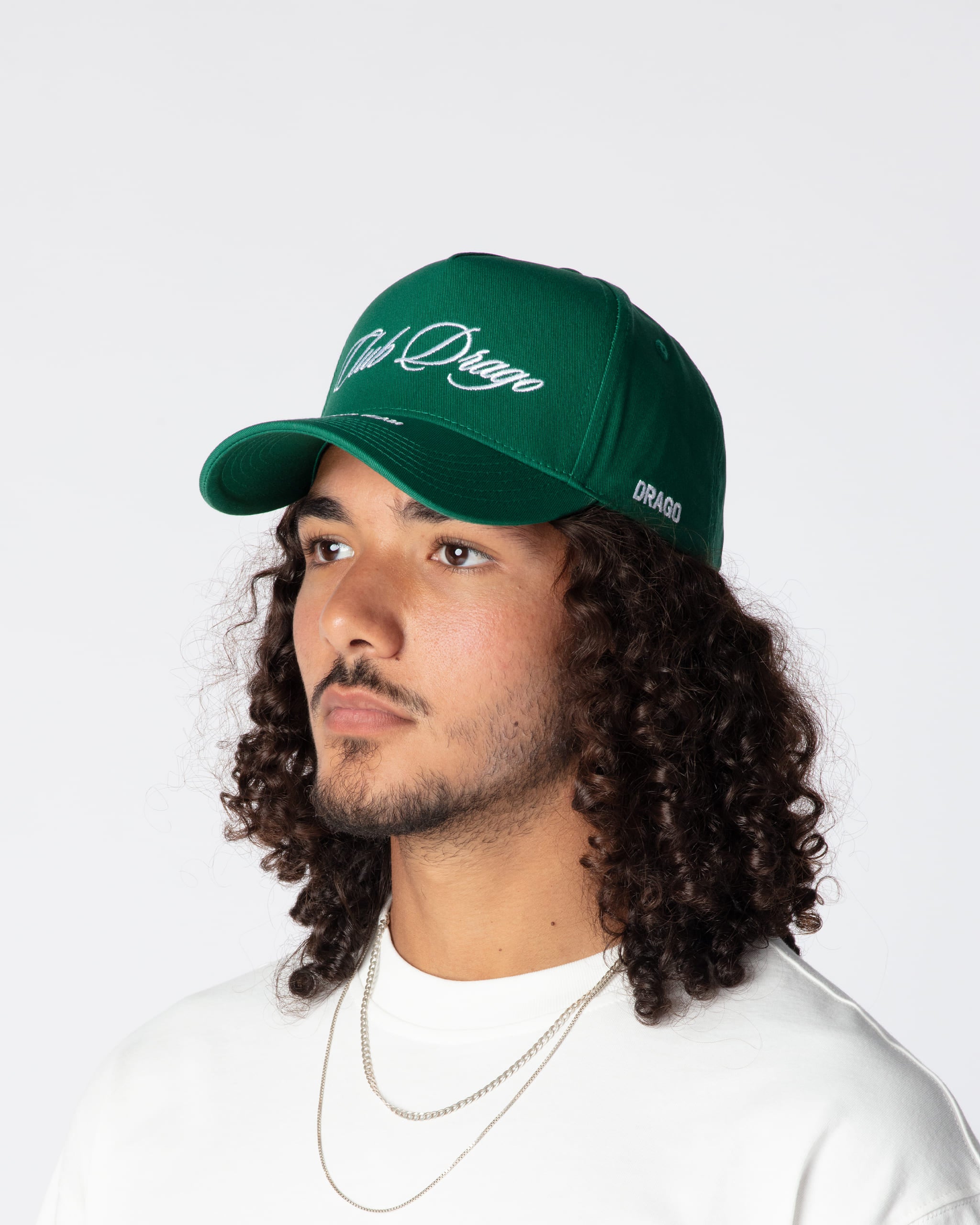Front diagonal side view of Ahmed in the Racing Team Trucker Cap from 100% cotton