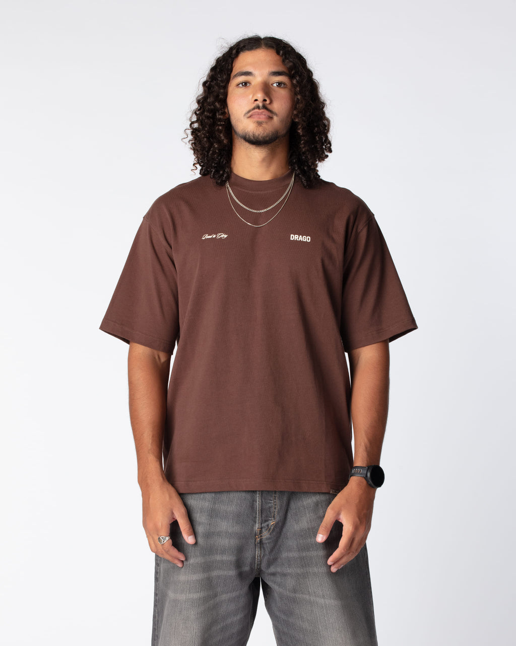 Front shot of Ahmed in Road to Heaven T-Shirt in Royal Brown with chest screenprint