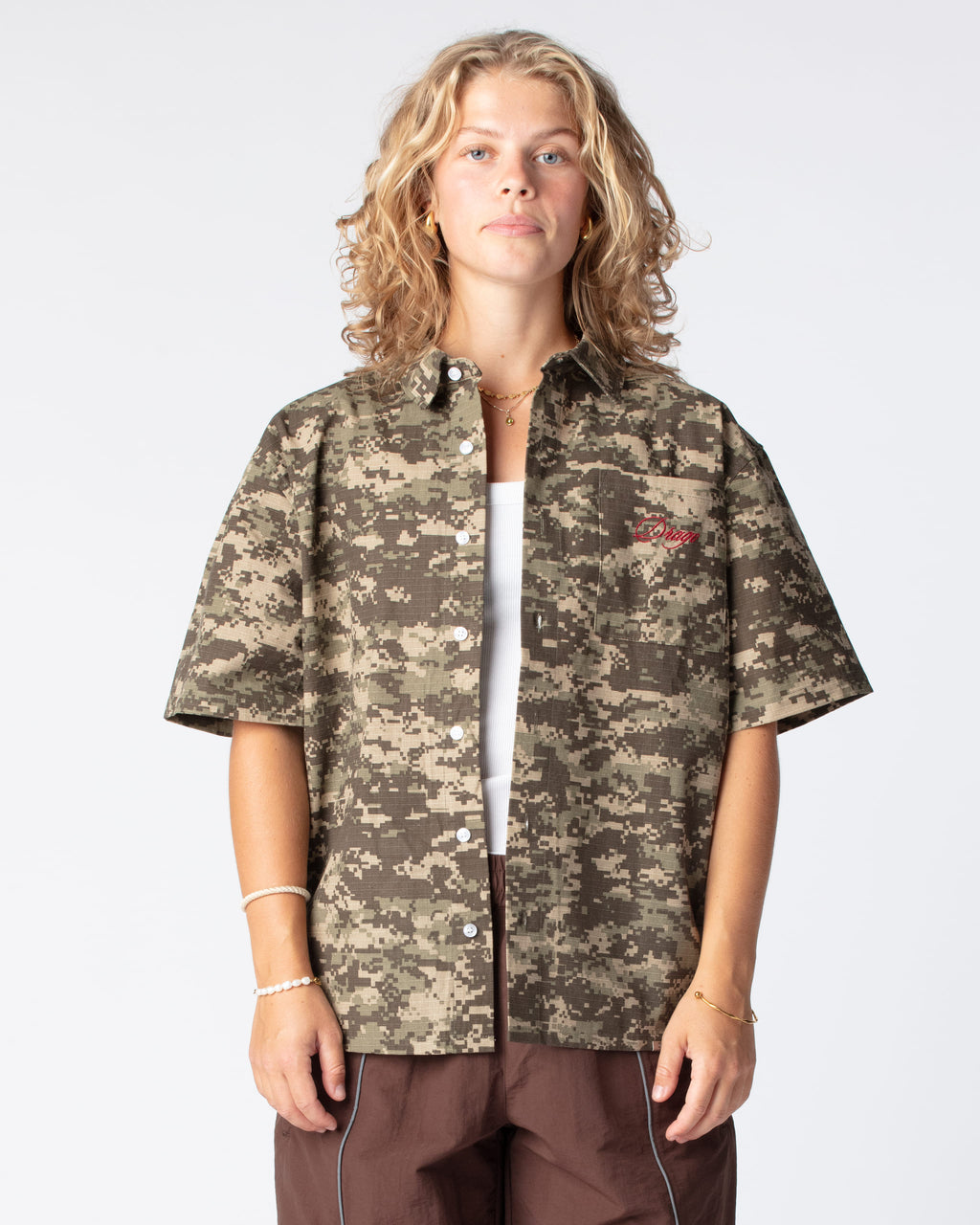 Our bestseller top: The Script Short Sleeve Button Up Shirt in Digital Camo