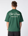 Rear shot of Mathias in our Racing Team T-Shirt in a rich British Racing Green color