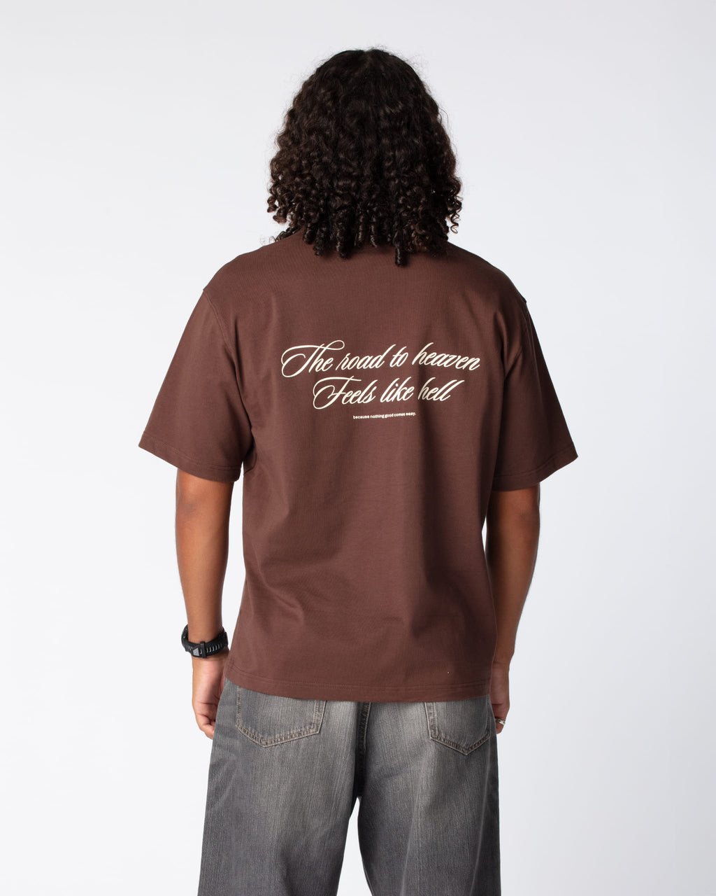 Ahmed in DRAGO Road to Heaven T-Shirt from the rear