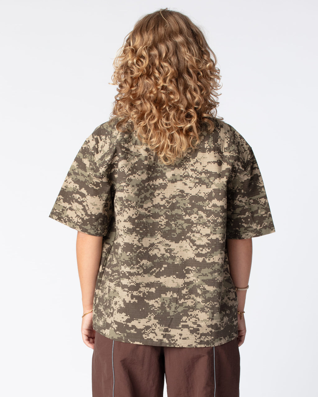 Rear shot highlighting the popular box-fit shape of the DRAGO Short Sleeve Script Shirt