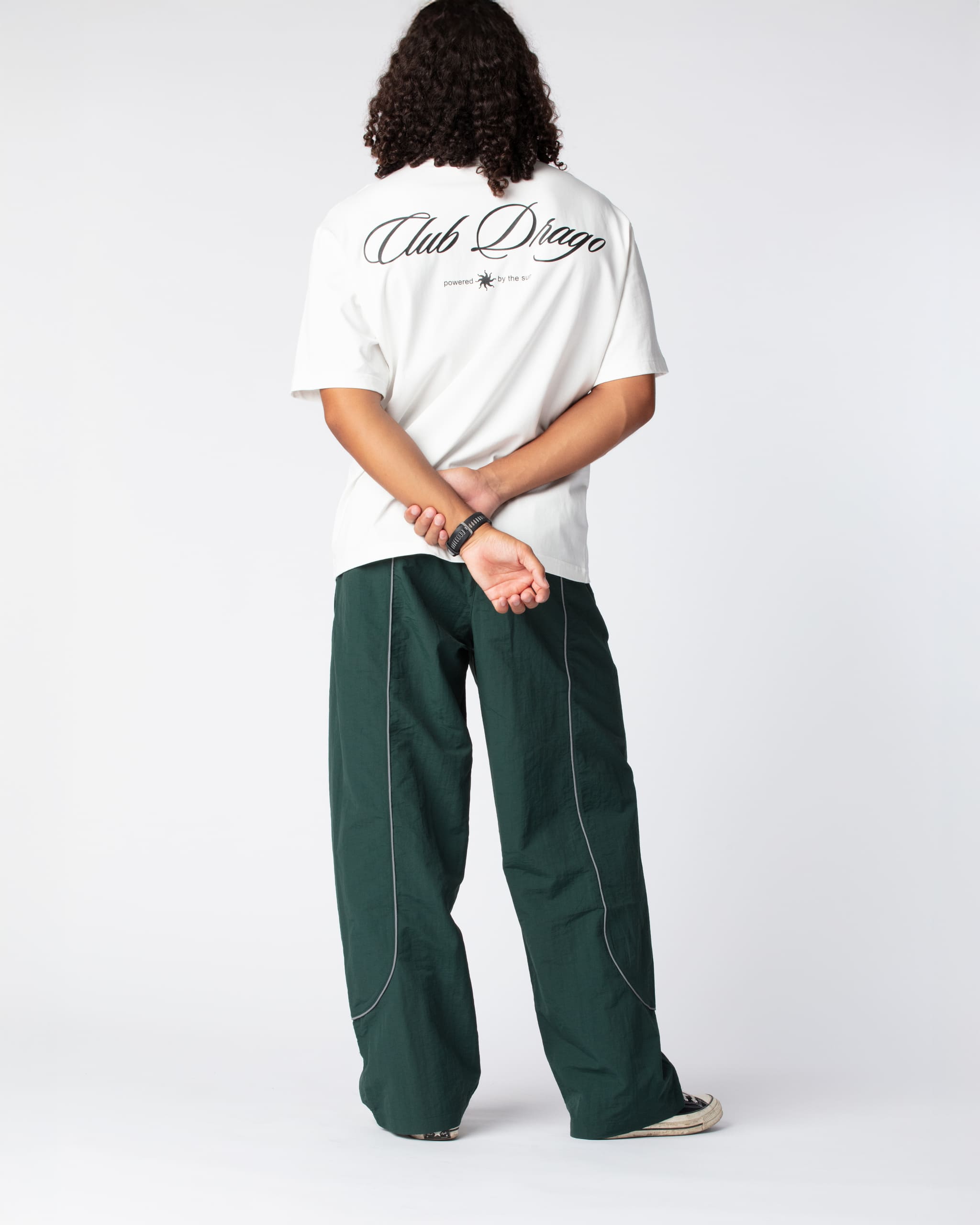Rear shot showing off the Olive Green Track Pants highlighting the premium composition of material and fit