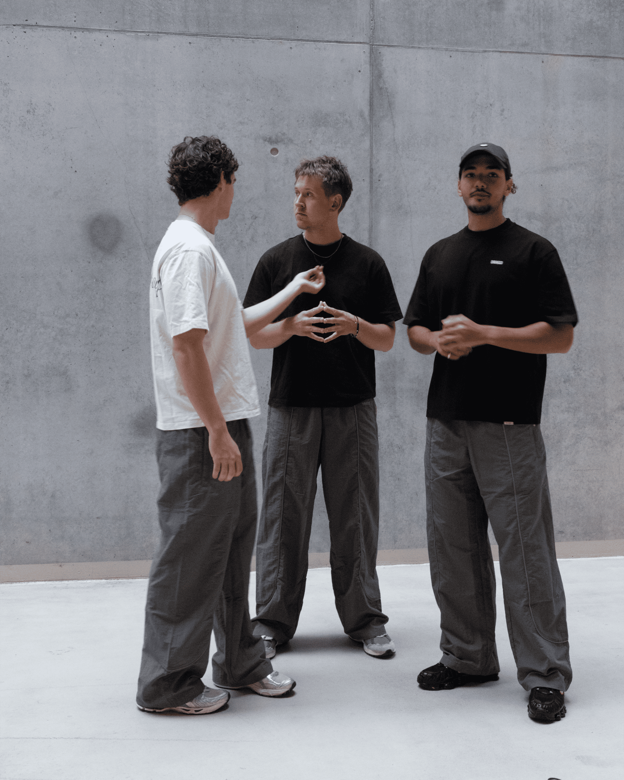 Group shot of Marco, Mathias & Ahmed in DRAGO Track Pants Steel